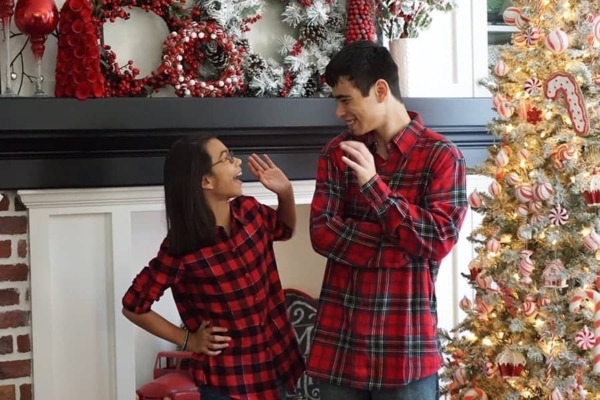 My son and daughter having fun during the Christmas photo shoot