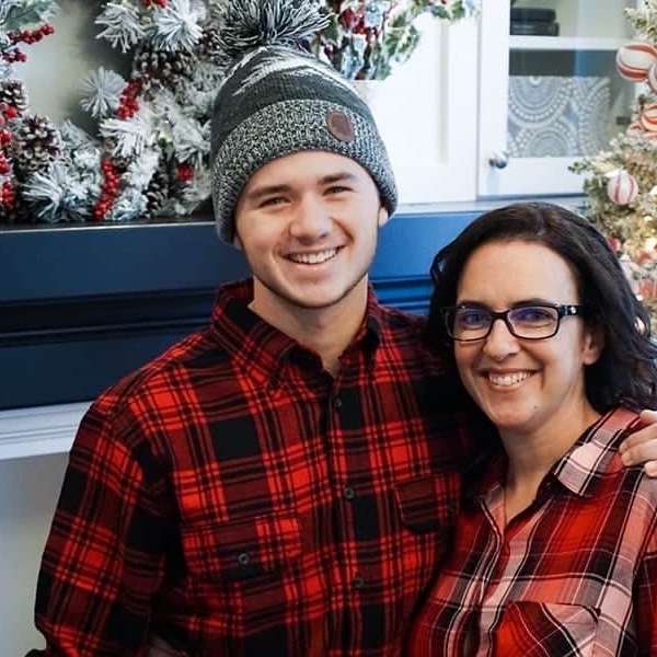 My son smiling for family Christmas card photos