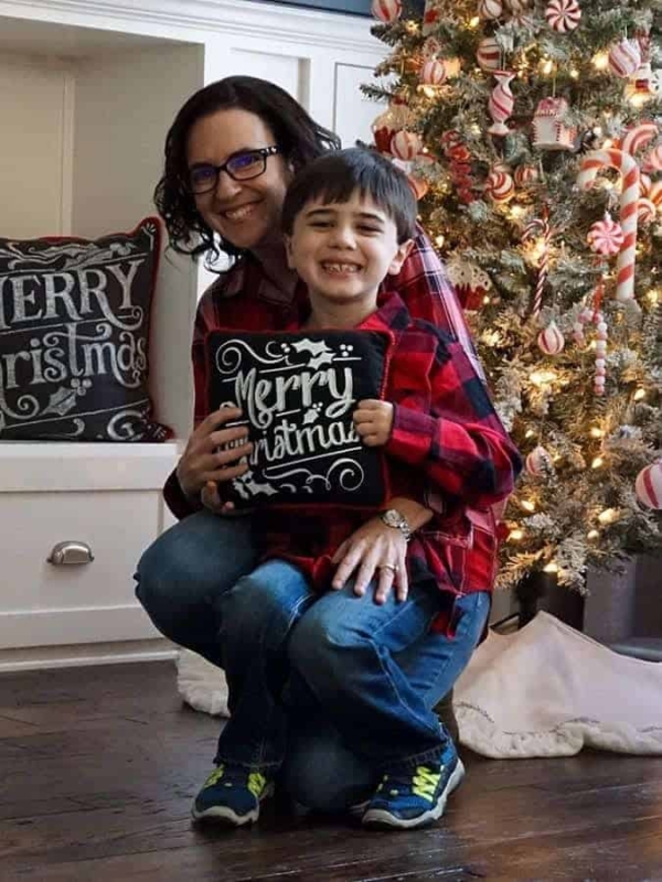 Mom and son smiling for Christmas photo