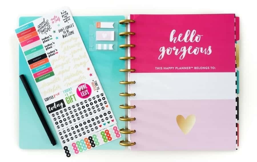 The parts of The Happy Planner Kit opened and displayed