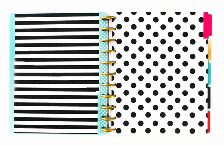 The Happy Planner opened to dividers designed with polka dots and stripes