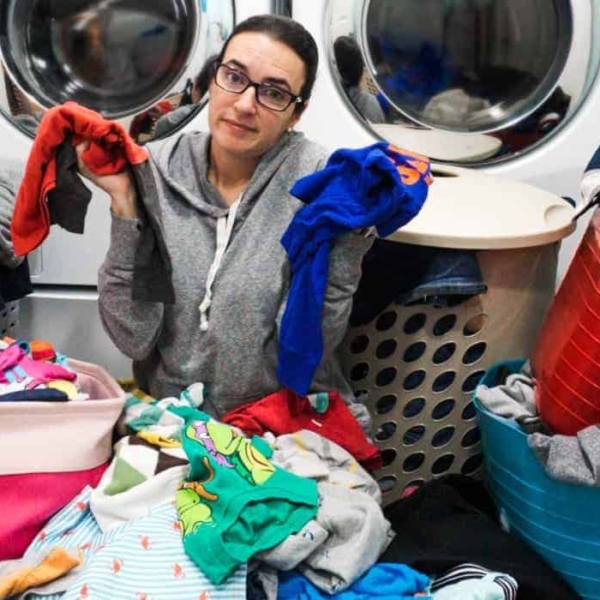 valerie buried in a pile of laundry