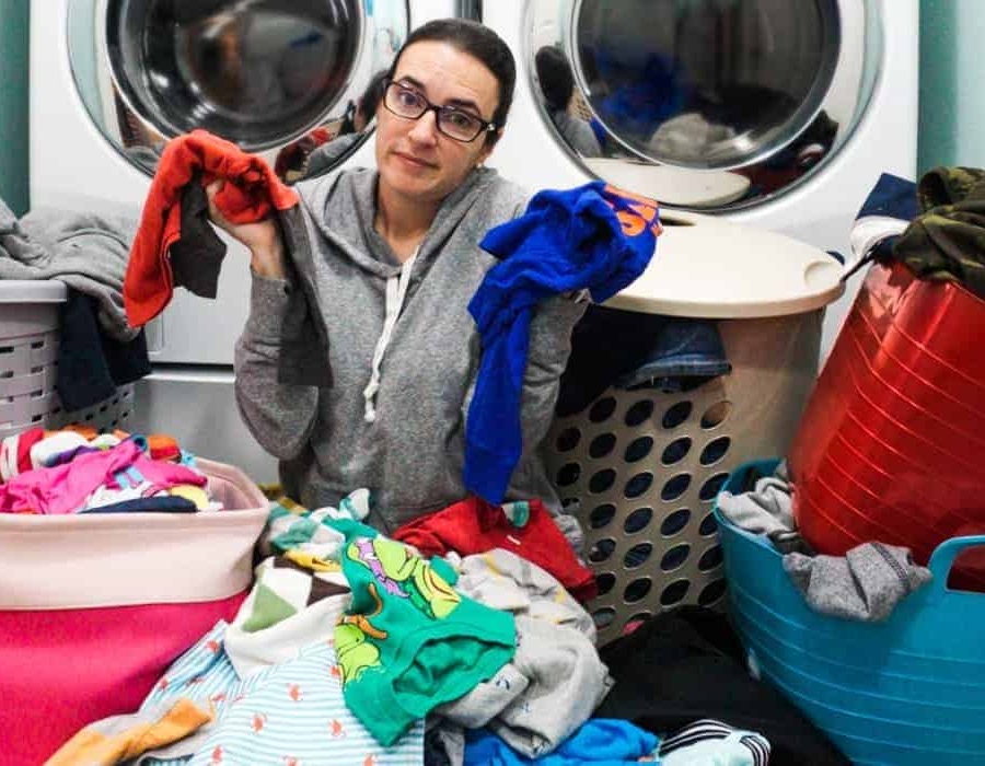 valerie buried in a pile of laundry