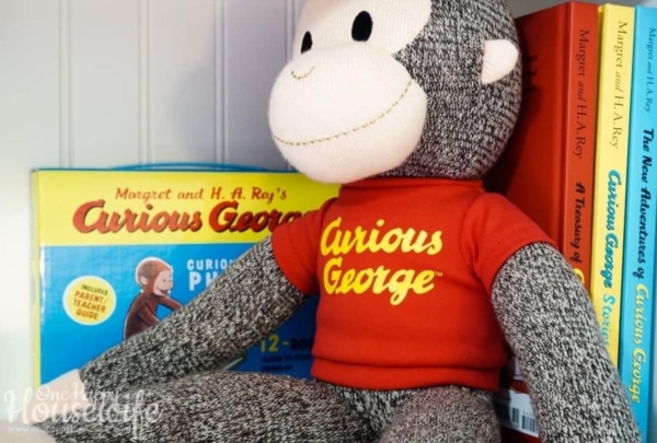 Curious George Toys and Books Organized on Shelves in a Boy's Room