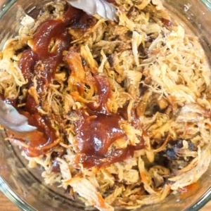 Mixing Bar-B-Que Sauce Into Shredded Pork