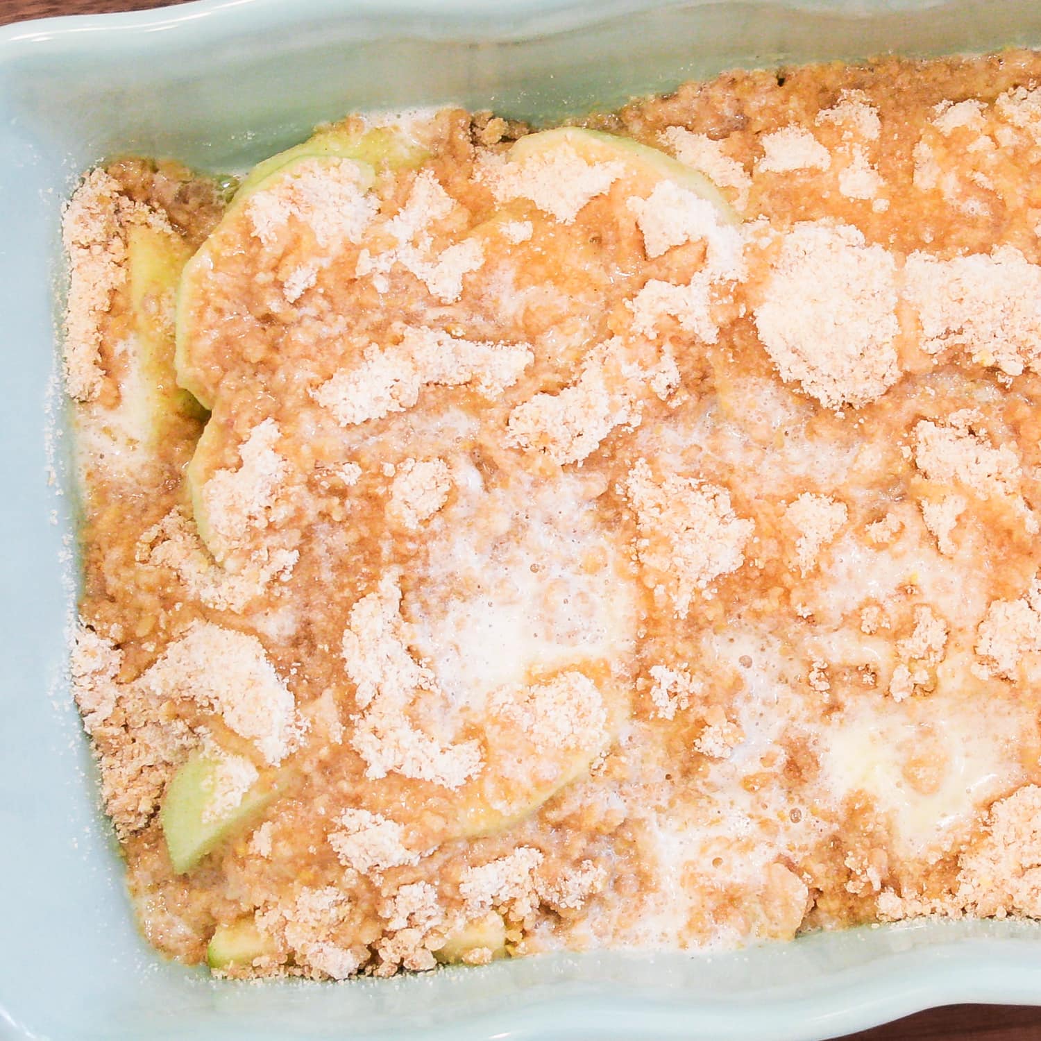 Apple crumble ready to place in the oven and bake.