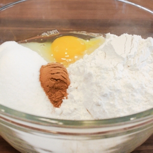 Ingredients for apple crumble in a glass bowl