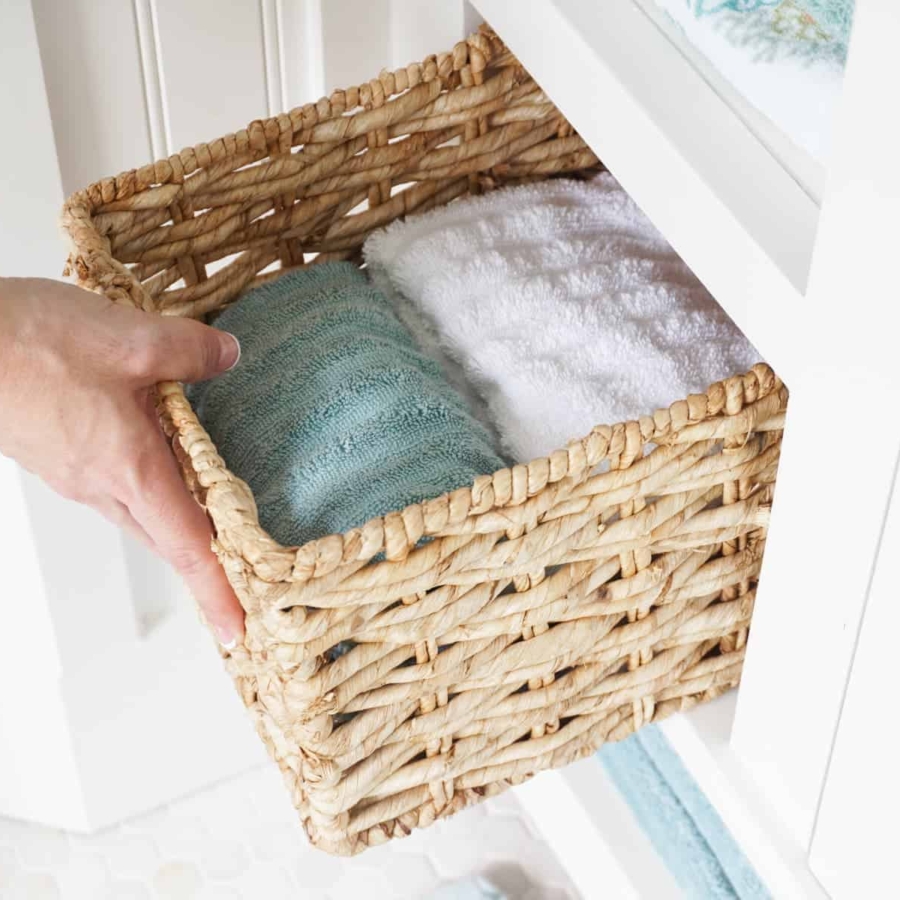 Store bath towels in baskets