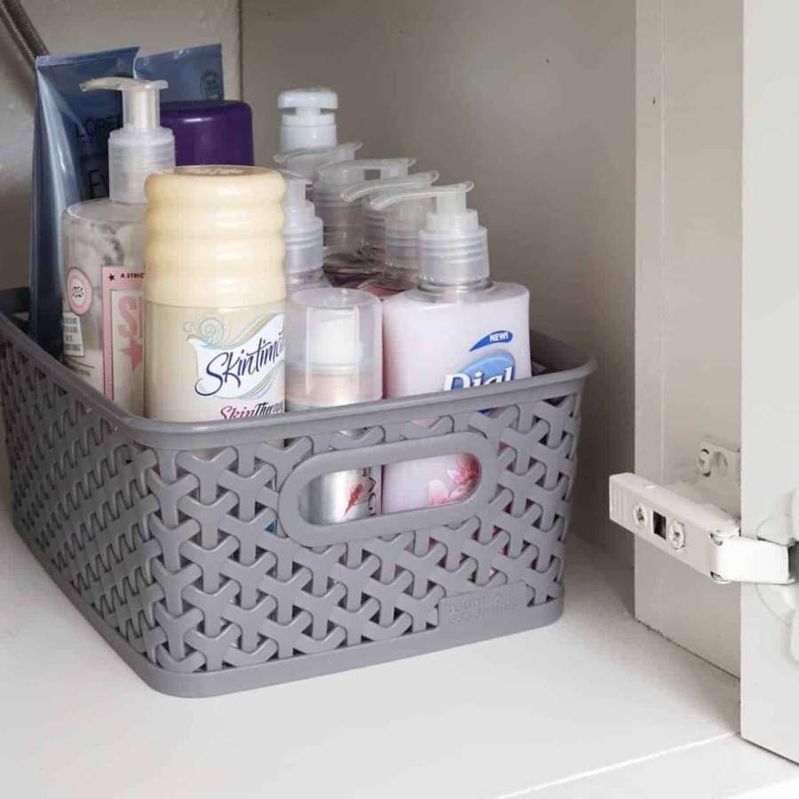 Use bins and baskets under the sink to keep the counters clear