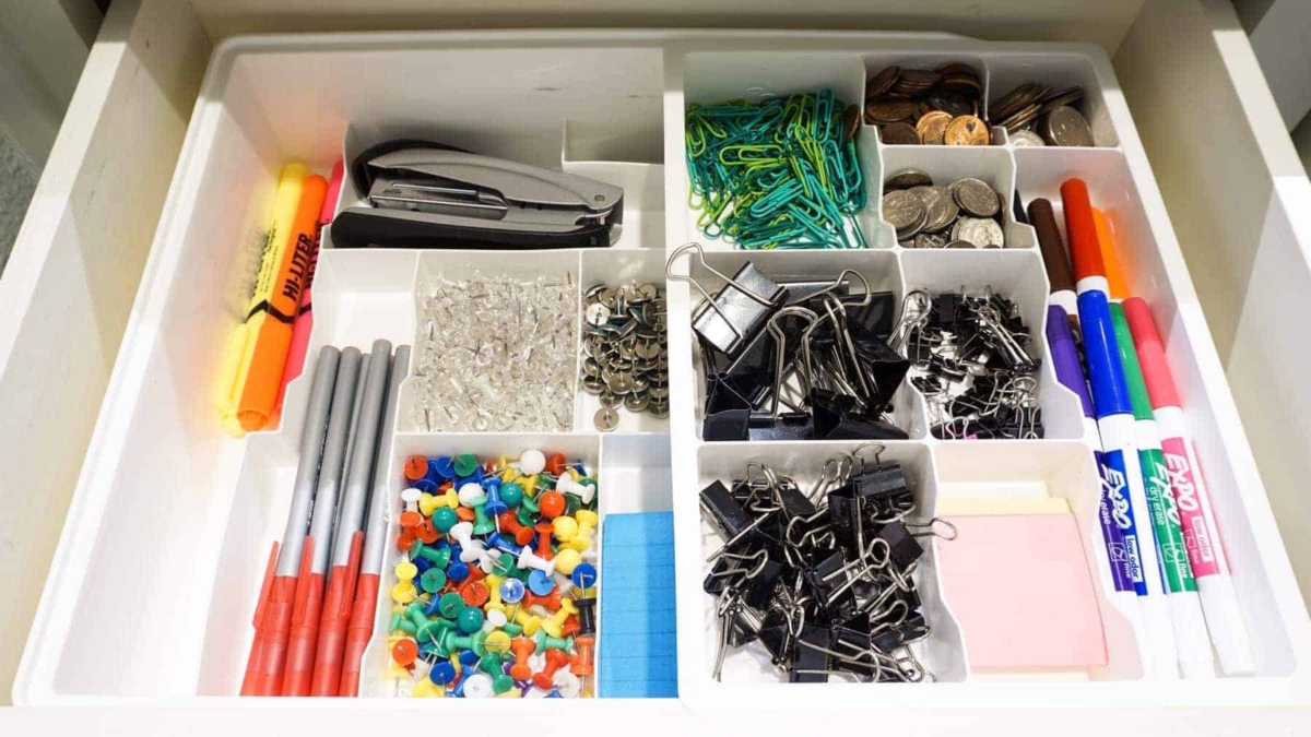 The Everything Drawer organizer from The Container Store helps me keep my junk drawer completely organized and decluttered.