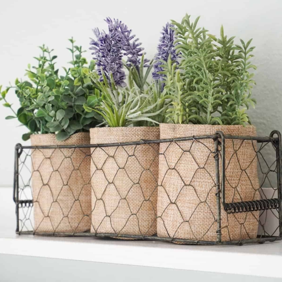 Decorating with lavender flowers planted in burlap sacks and placed in a chicken wire basket.