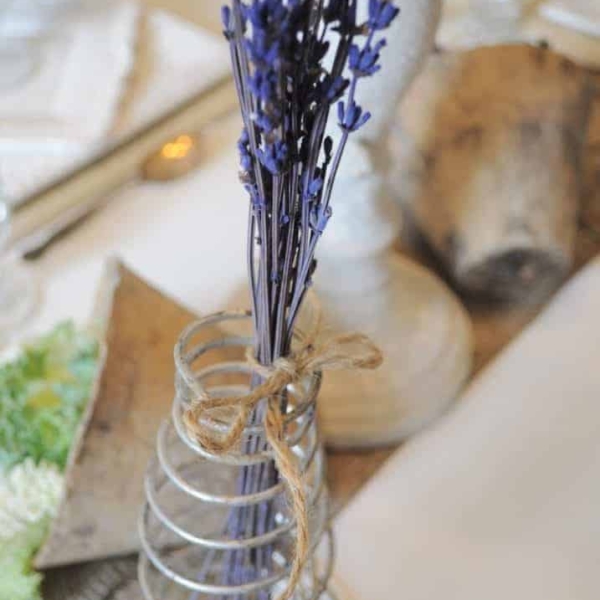 Lavender stems decorate this tablescape.