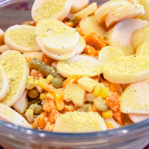 Ingredients for 5 minute chicken pot pie placed in a bowl.