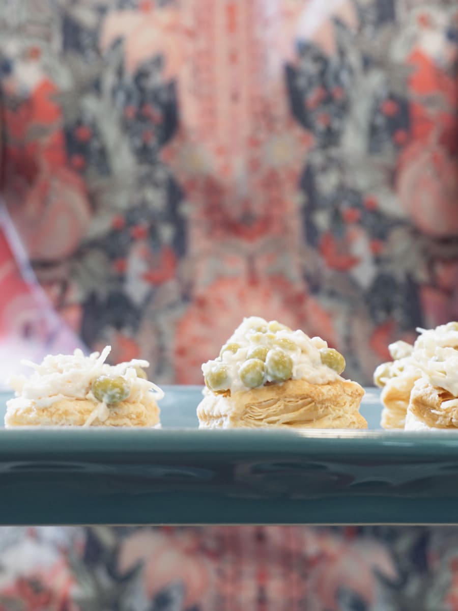 puff pastry cups filled with chicken, mayo, and peas dip