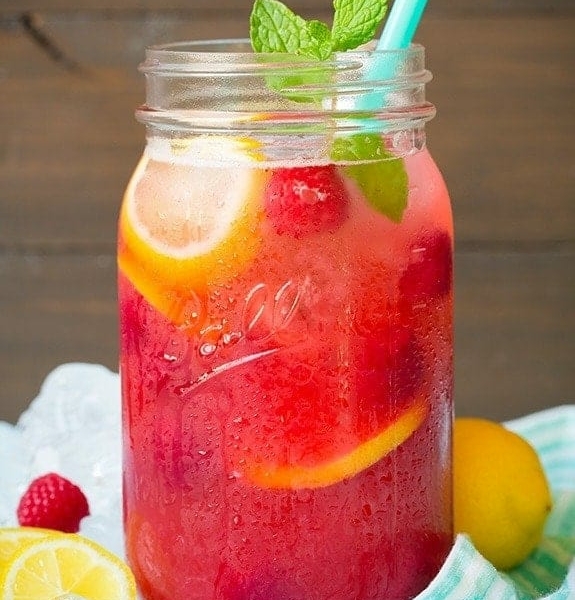 a mason jar with sparkling raspberry lemonade