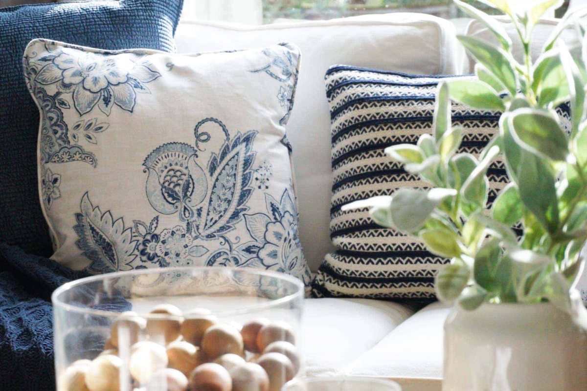 A white sofa is the perfect backdrop to color throw pillows and throw blankets.