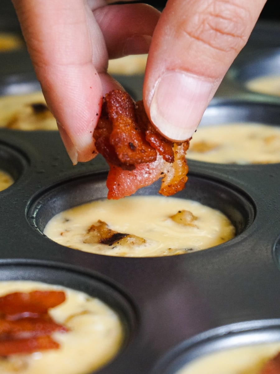 Adding bacon to the Frittata Poppers.