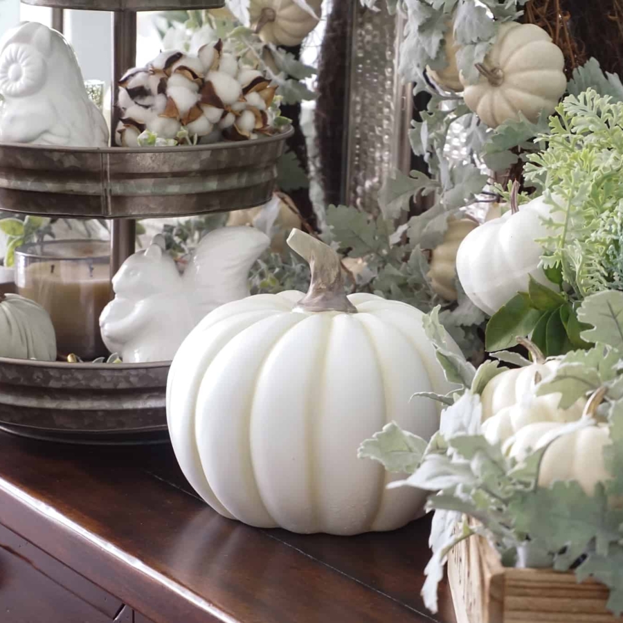 a neatly decorated table for fall