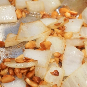 Toasting macadamia nuts and caramelizing onions in the Instant Pot for this delightful Hawaiian Chicken recipe.