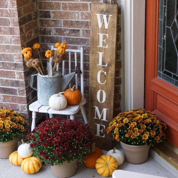 Decorating a front porch for fall.