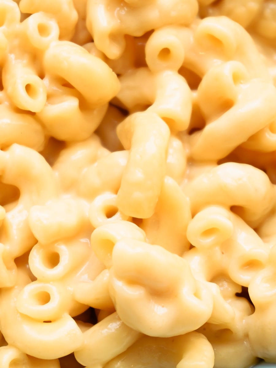 a close up of creamy macaroni and cheese