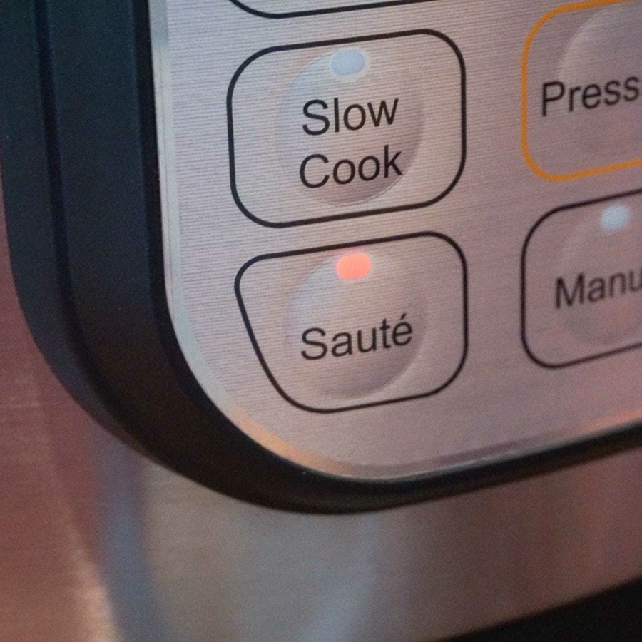 Using the Instant Pot sauté function to sauté vegetables.