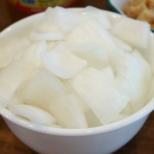 Roughly cut onion for Hawaiian Chicken made in the Instant Pot.