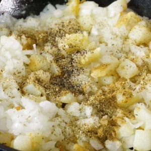 cooking the filling for beef and potato empanadas