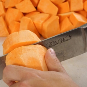 Cutting sweet potato for casserole in the Instant Pot