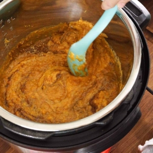 Mixing the ingredients into the sweet potato casserole