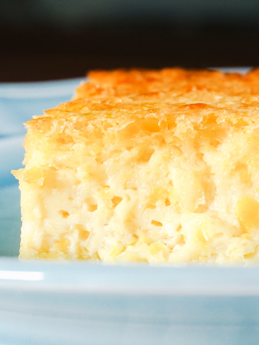 a slice of creamed corn casserole on a plate