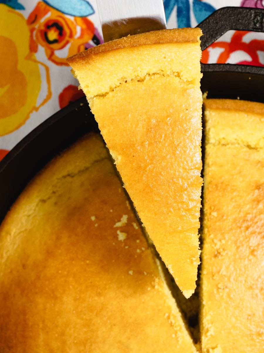 a thin slice of cornbread skillet removed from the skillet