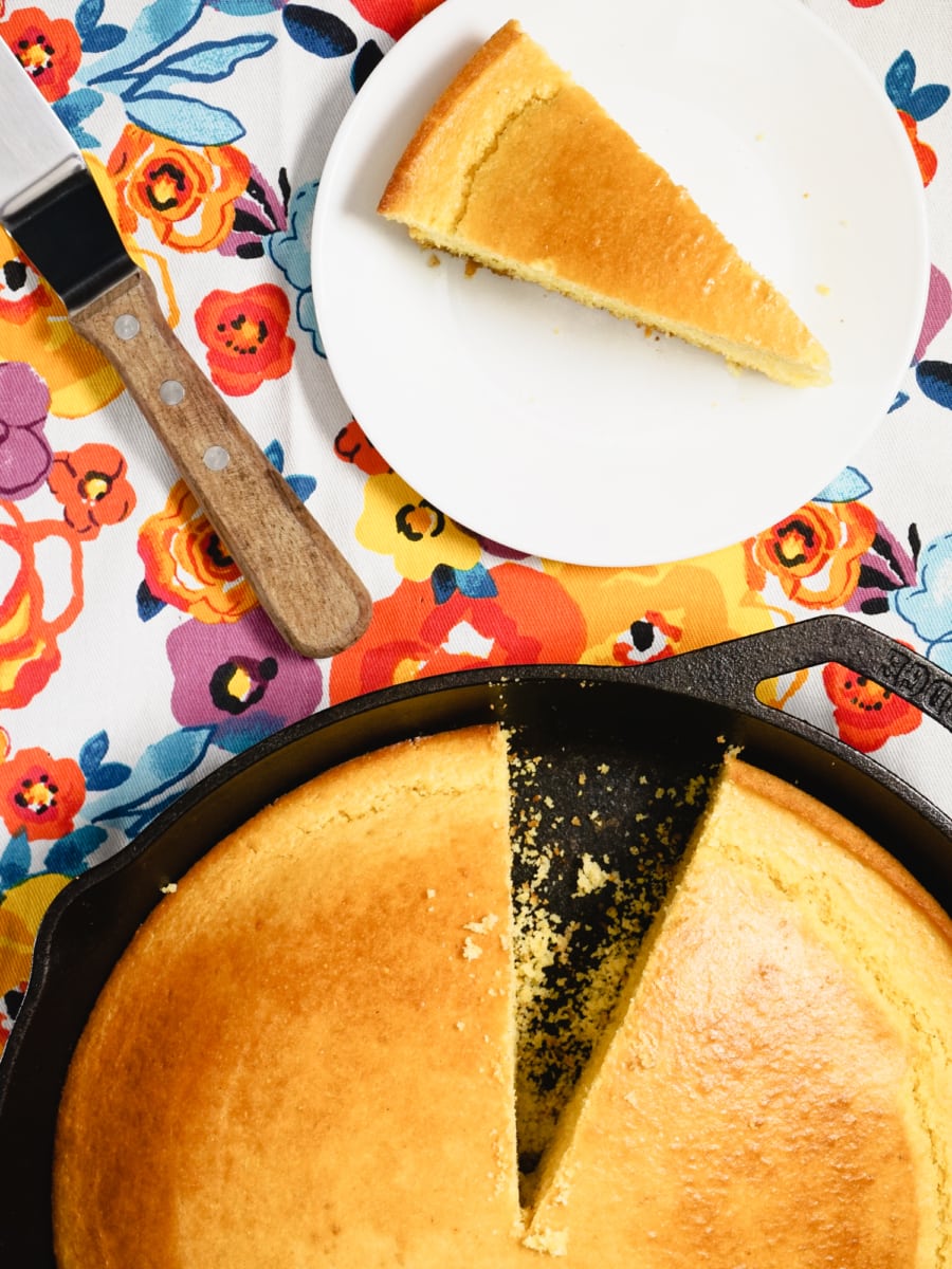 a slice of southern style skillet cornbread on a plate