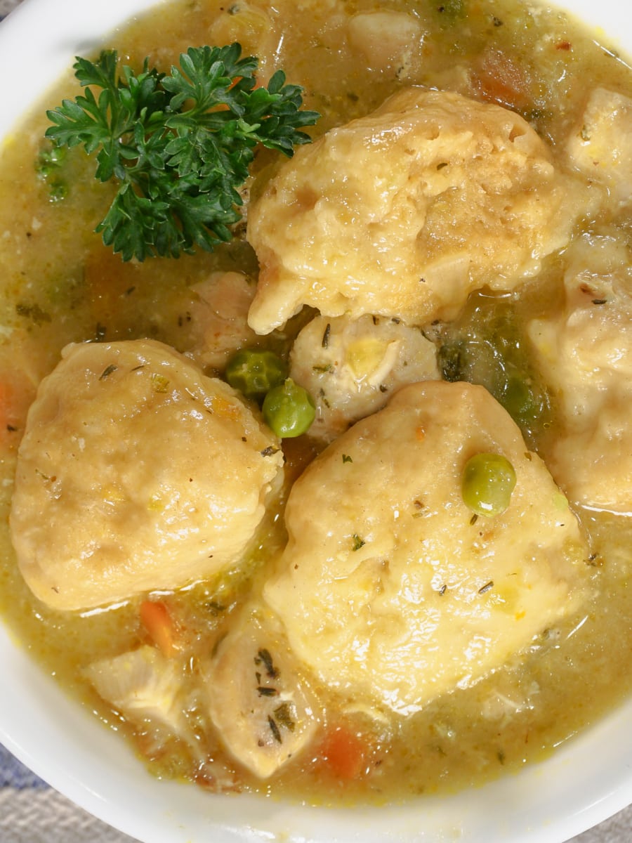 top view of chicken and dumplings served in a bowl