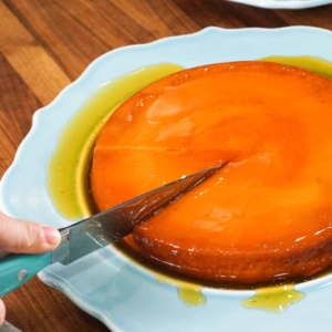 a flan dish being sliced