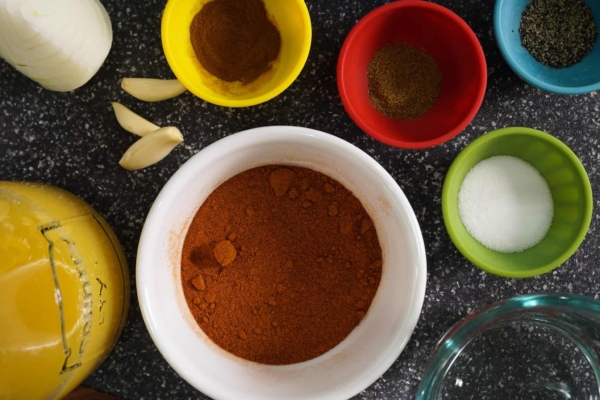 cochinita pibil is loaded with wonderful spices like annatto (achiote), cumin, cinnamon and oregano