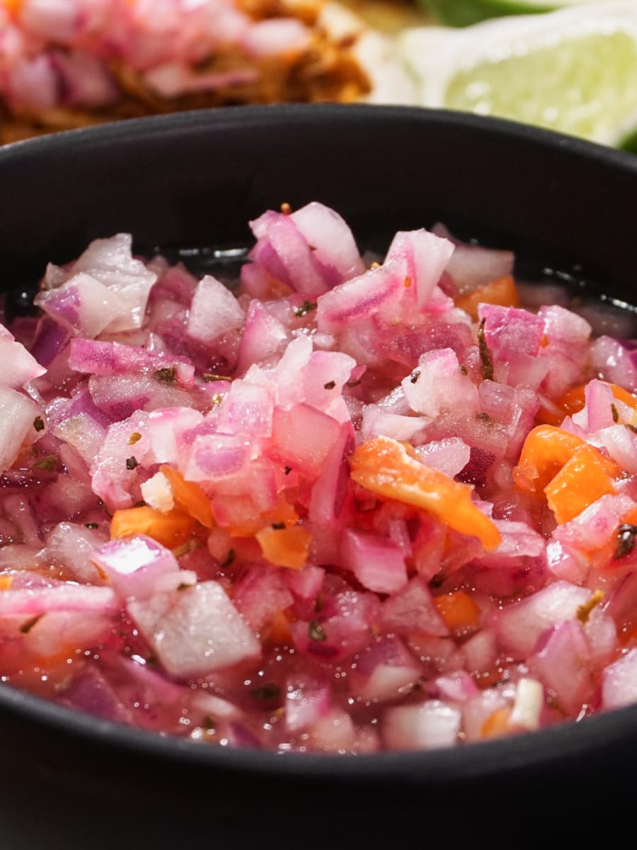 a bowl of spicy habanero lime salsa