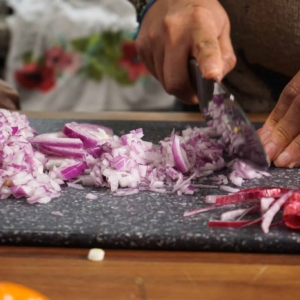 red onion is one of the main ingredients for this habanero salsa