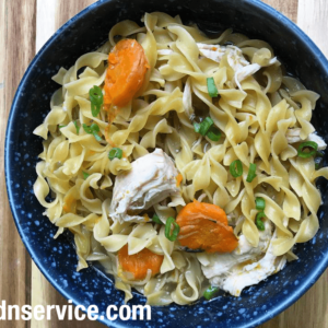 overhead shot of a bowl with chicken noodle soup