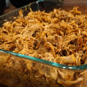 instant pot shredded pork in a pyrex