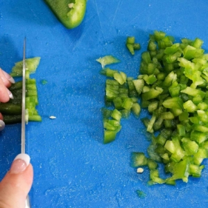 dicing green bell pepper for a salpicon mincemeat recipe