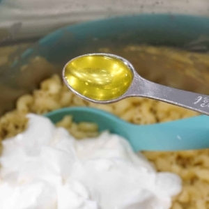 adding pickle juice to the instant pot macaroni salad