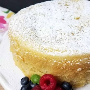 close up of a pound cake topped with powdered sugar