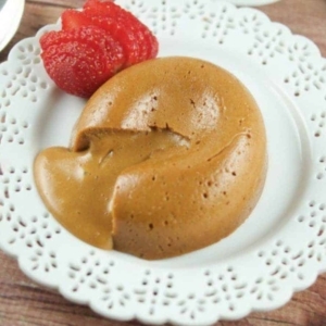 a dulce de leche lava cake cut open to reveal the inside