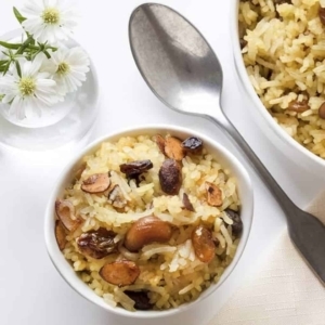 overhead shot of a small bowl of pakistani zarda sweet rice