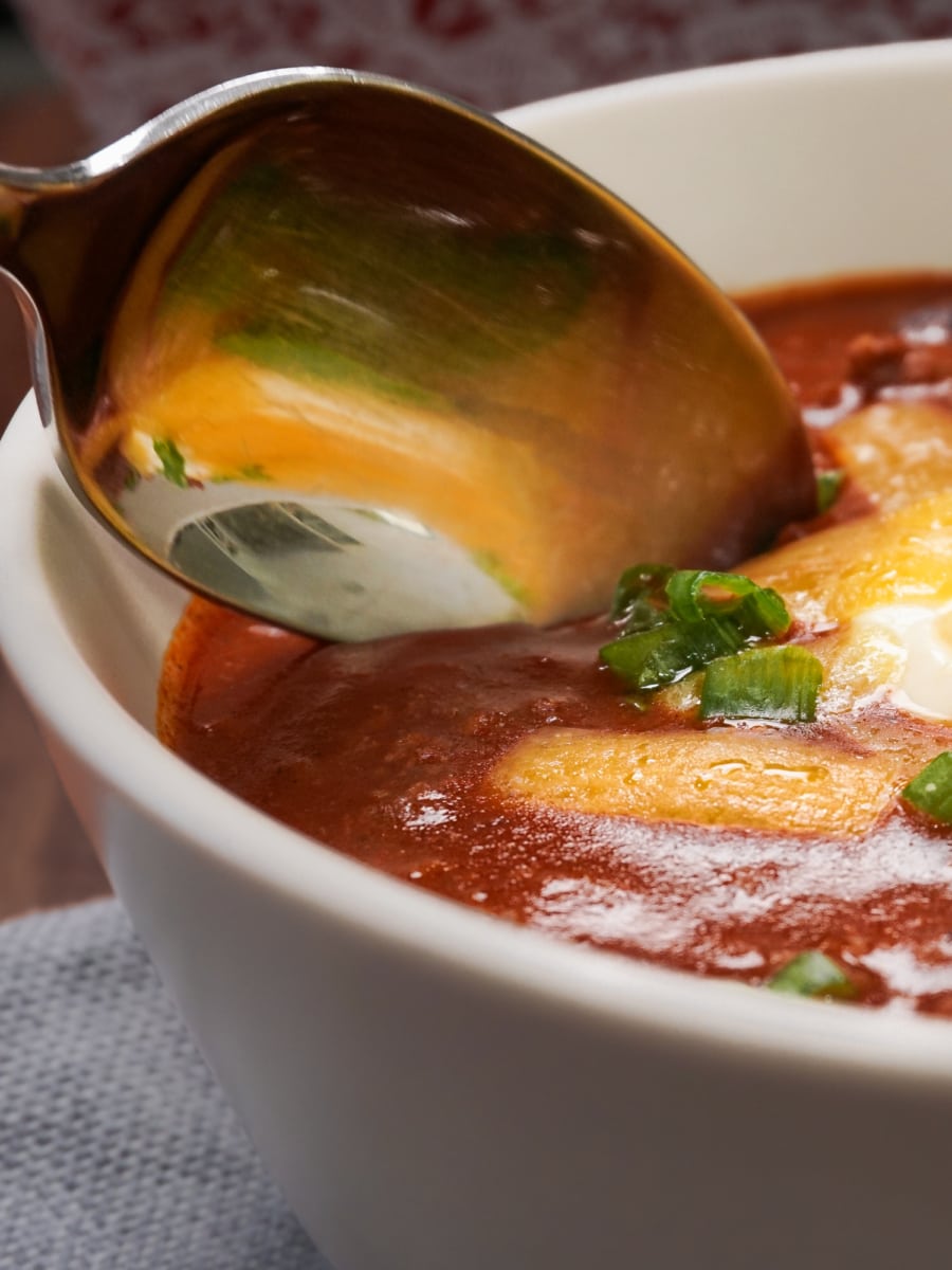 spoon in a bowl of chili