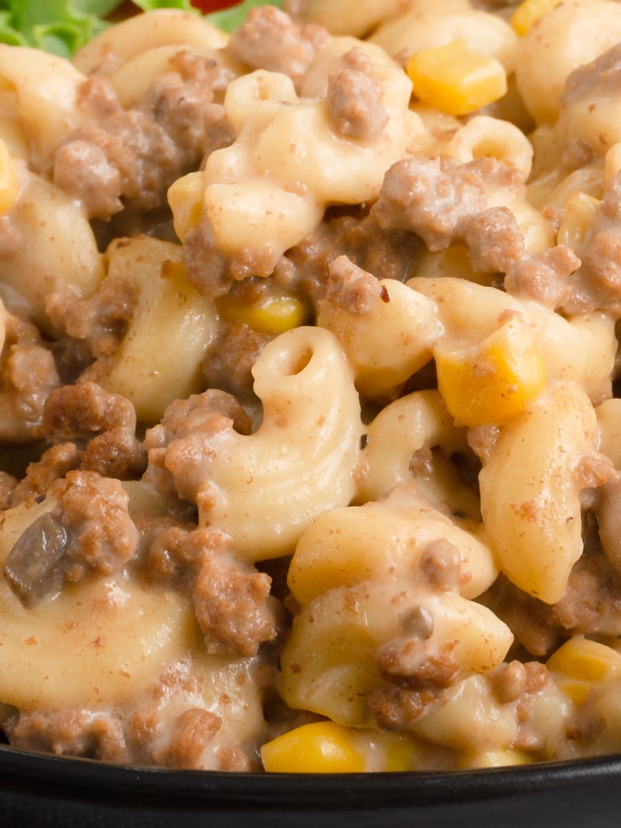 close up of beef and macaroni casserole topped with parmesan cheese