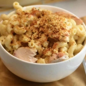 a bowl of with a serving of cajun chicken alfredo