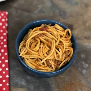 a small bowl of spaghetti