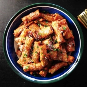 overhead shot of a bowl of vegetarian rigatoni bolognese